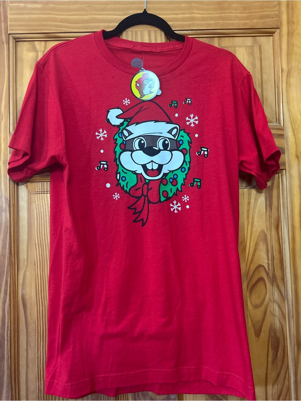 Red Holiday Graphic Tee with Festive Character see description